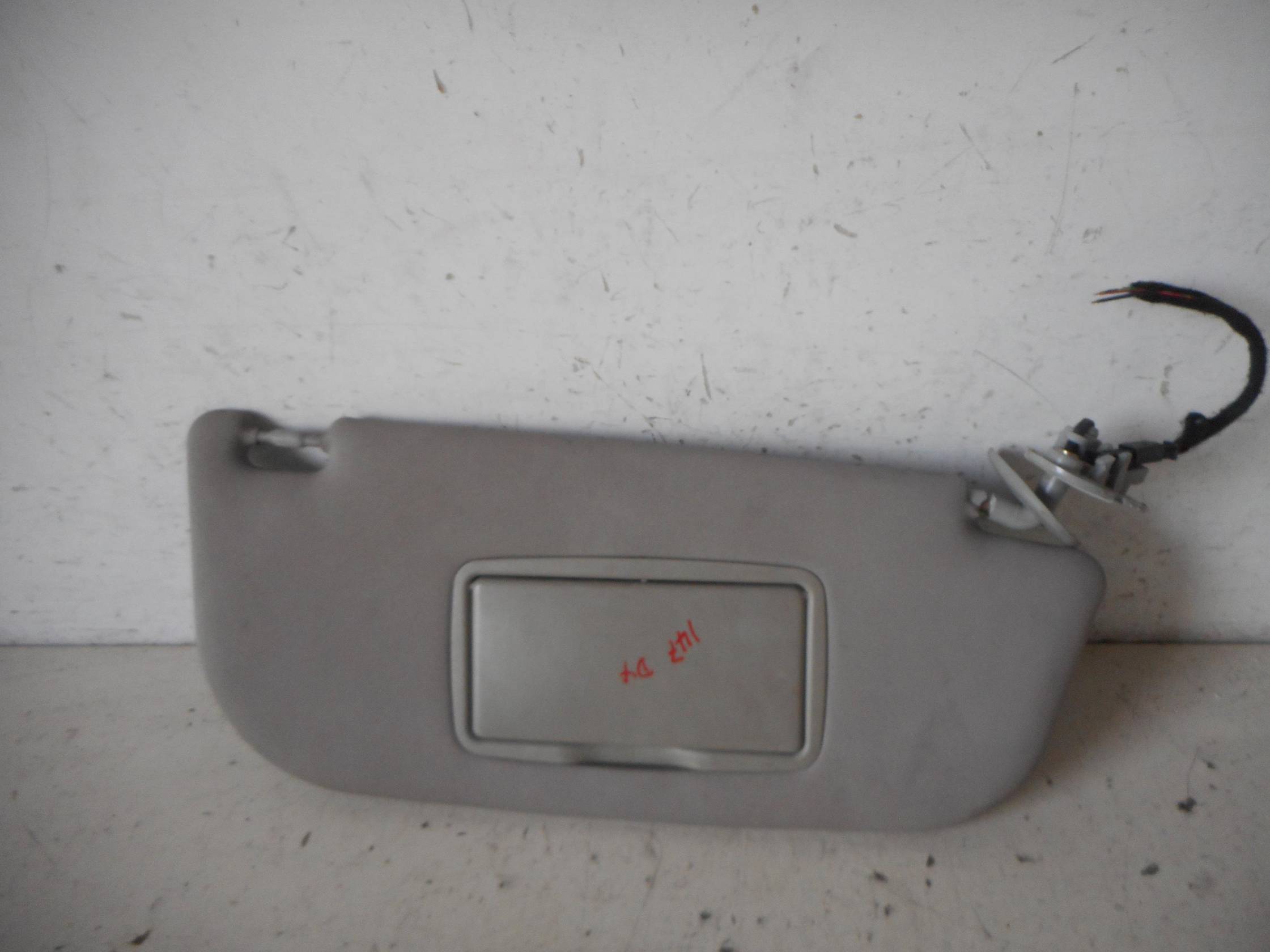 Aletta parasole parabrezza dx.